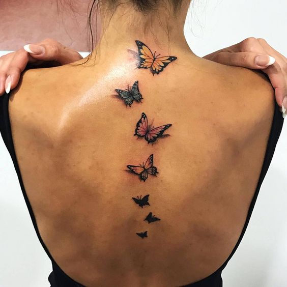 Tatoo papillon pour femme dans le dos