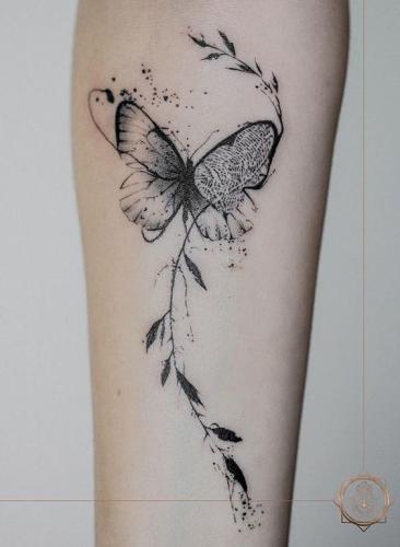 Idée tatouage papillon femme sur bras